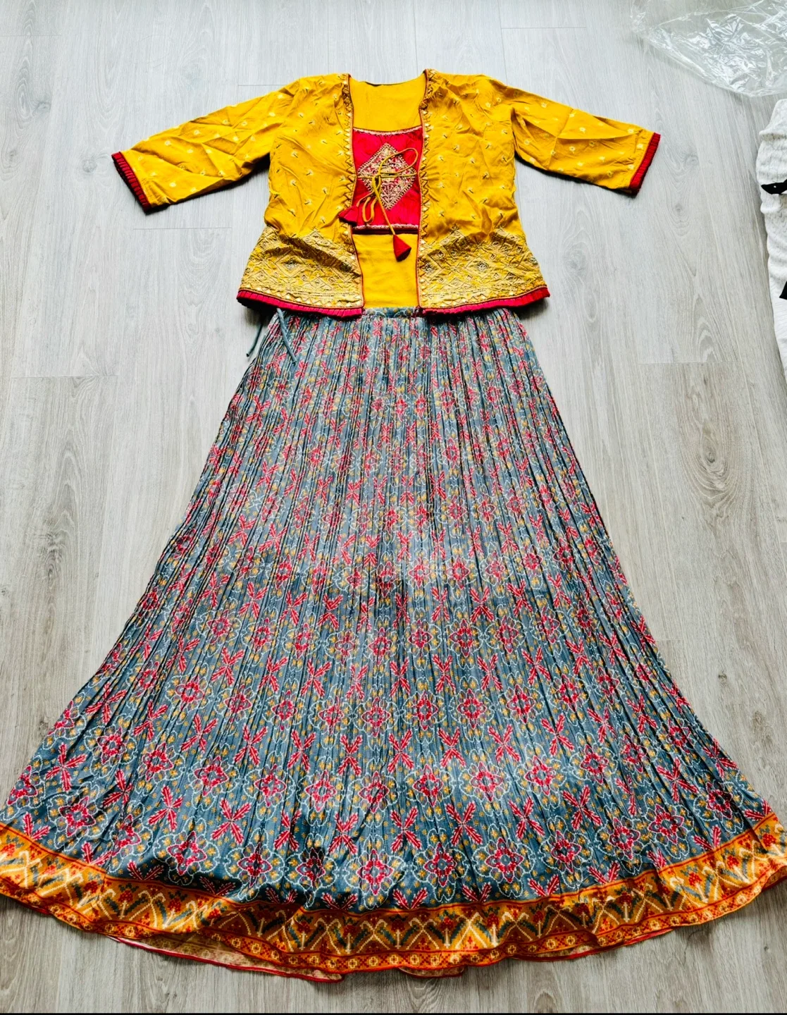 Designer mustard color lahenga set image indicator(3)