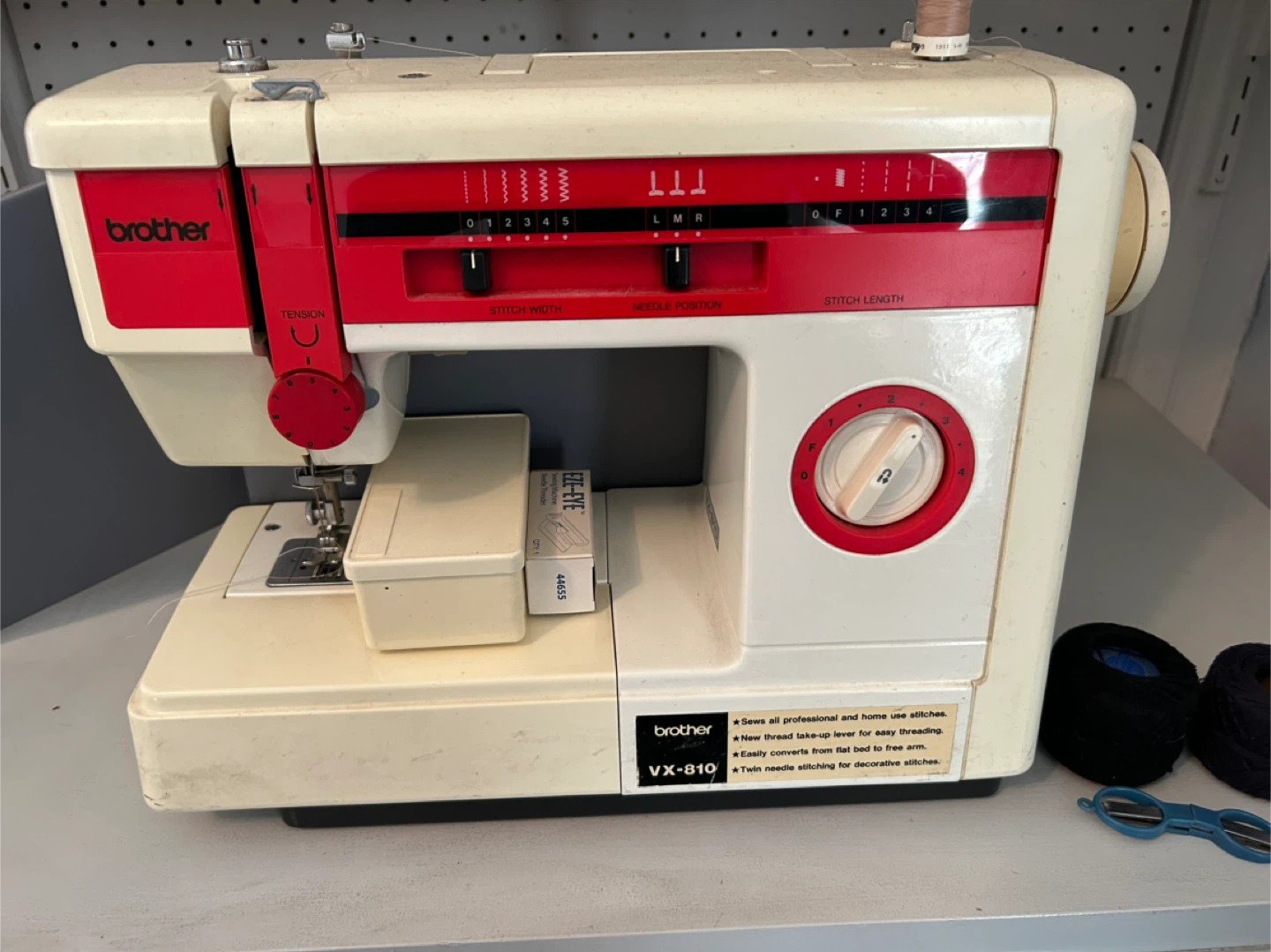 Brother sewing machine plus sewing basket and textile fabric
