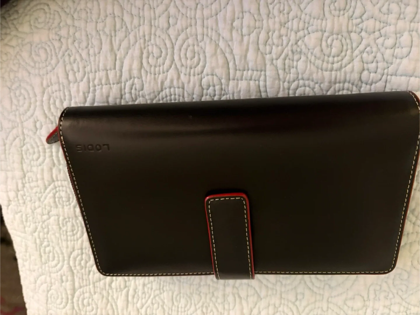 New black faux leather wallet. Red interior image indicator(3)