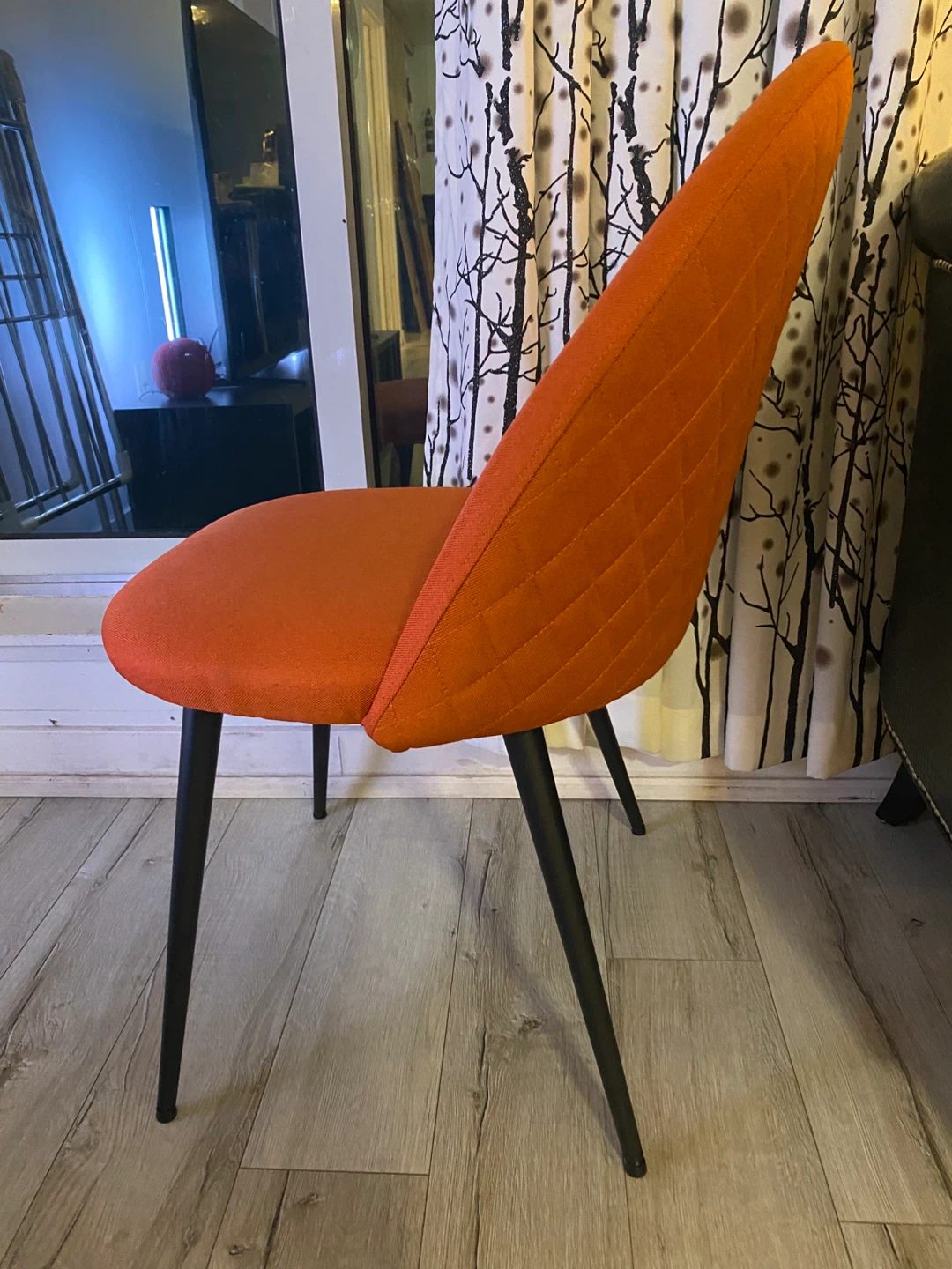 Orange chair with black legs - photo 2