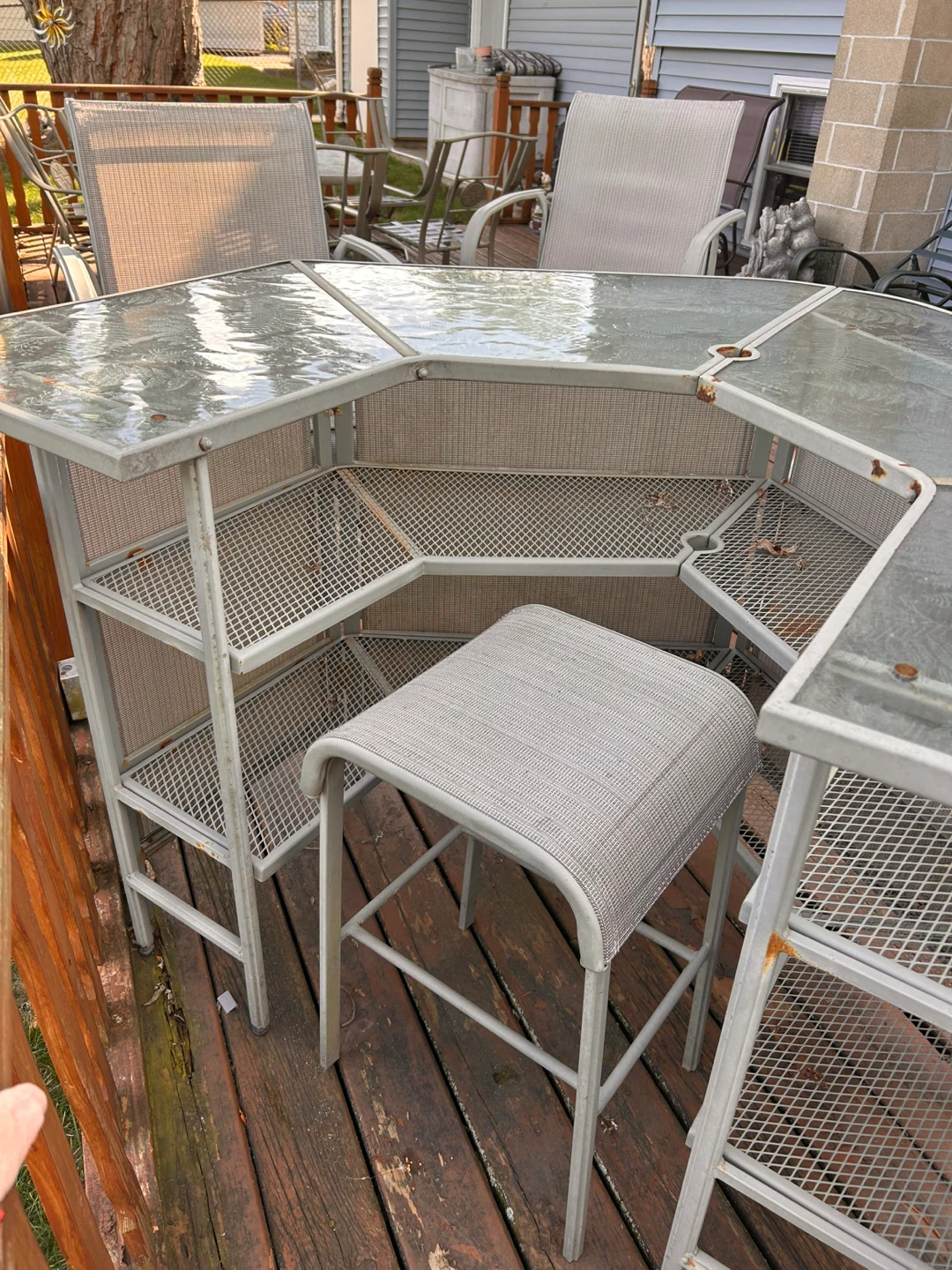 Outdoor Bar with 4 high chairs and one stool