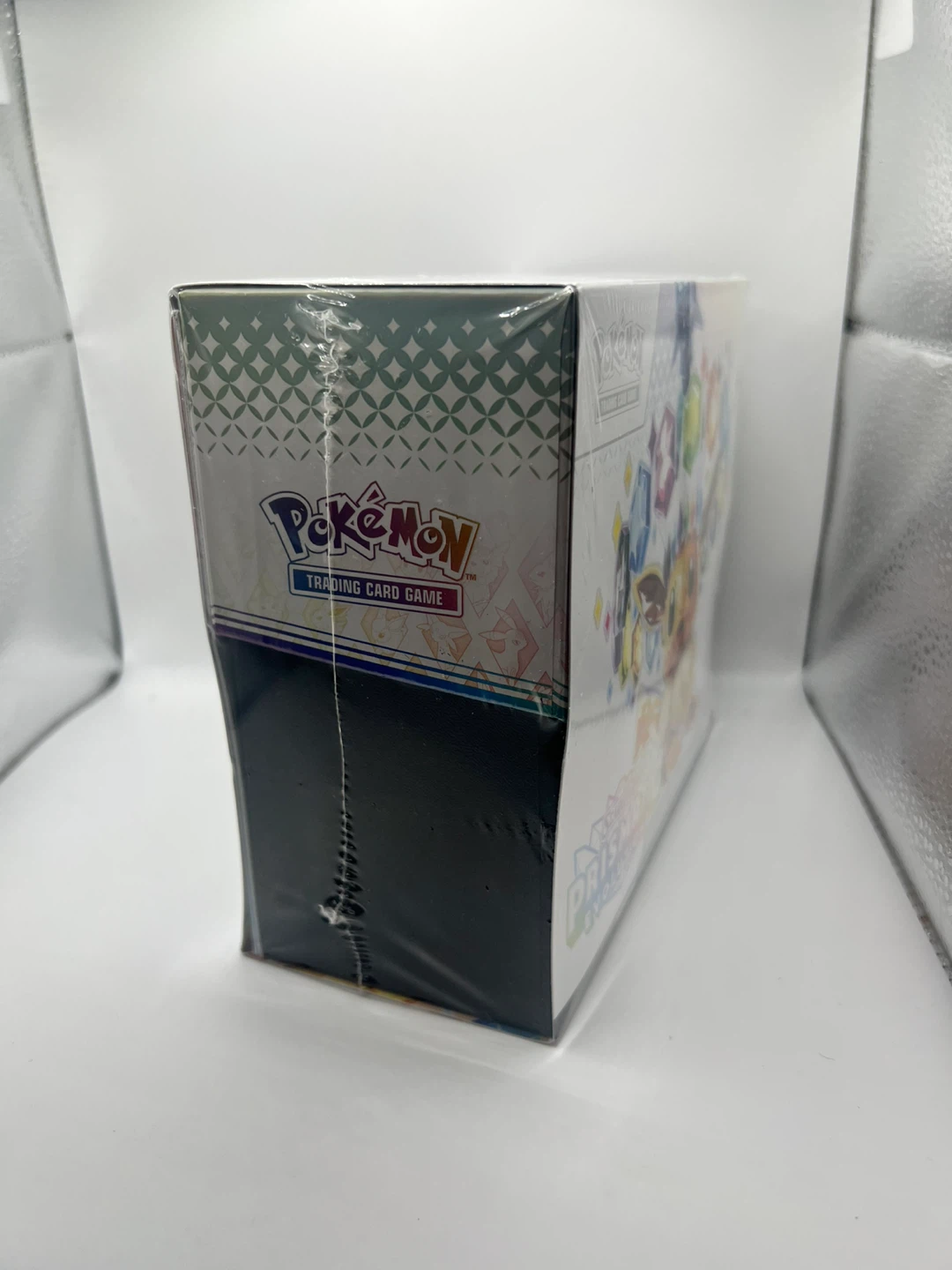 Pokémon Prismatic Eevee ETB - Damage to Shrink Wrap Only - photo 2