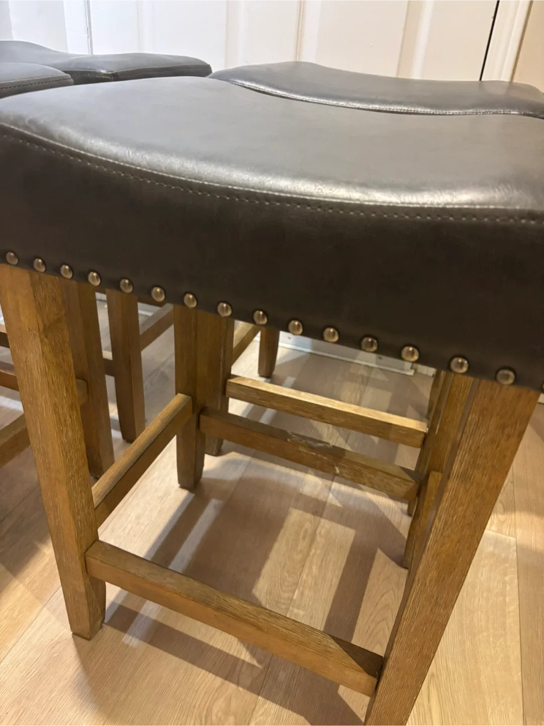 4 grey leather and wood counter stools image indicator(2)