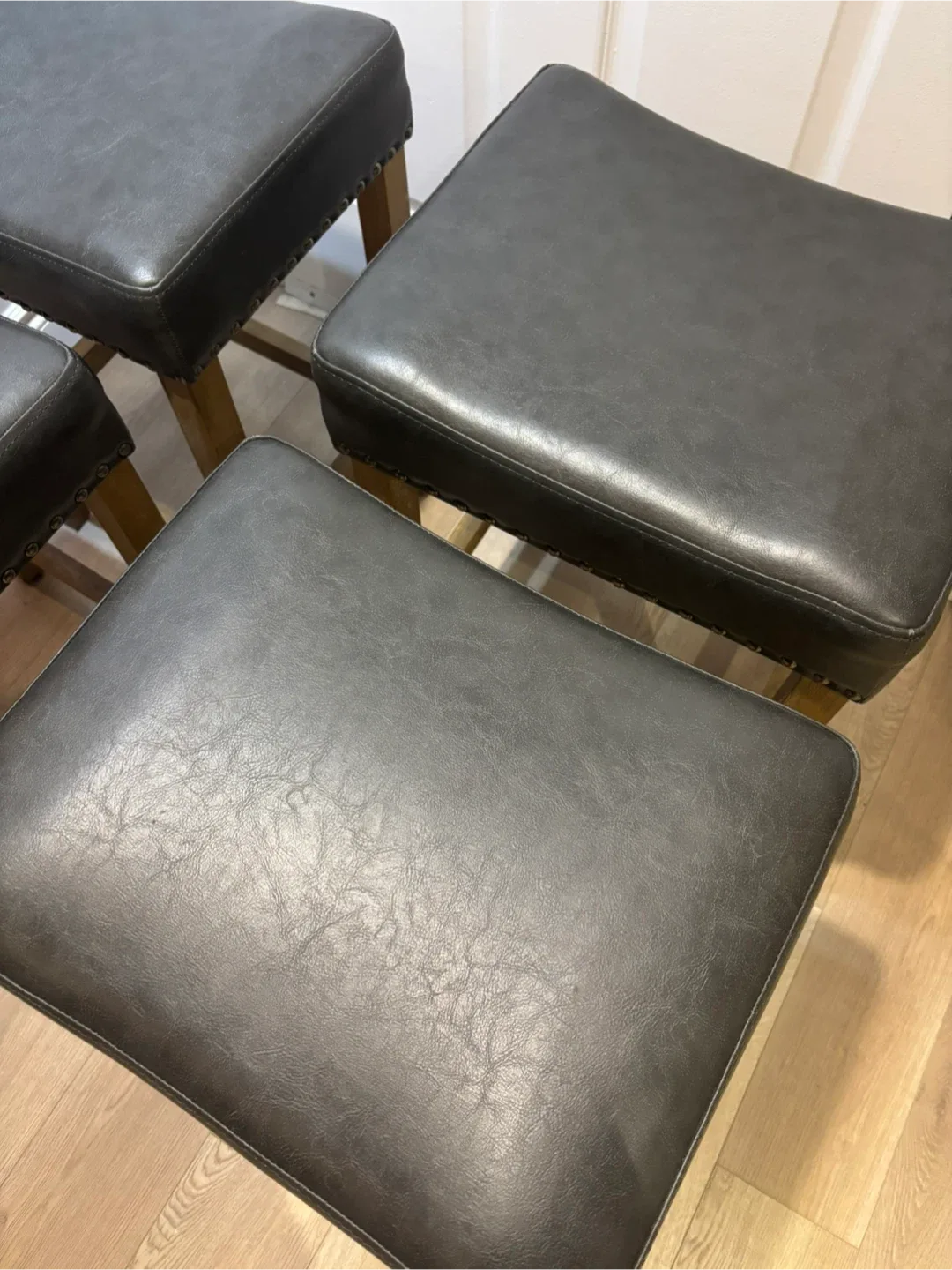 4 grey leather and wood counter stools image indicator(3)