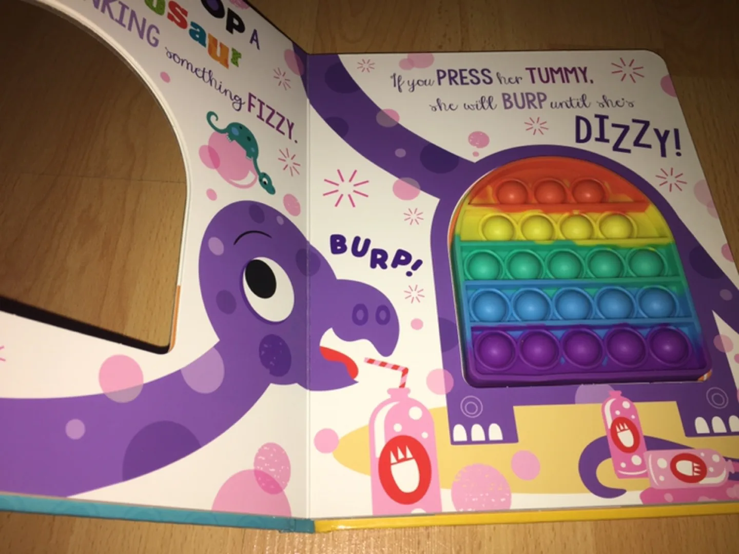 Never Pop A Dinosaur! Book with Sensory Pop-Its image indicator(2)