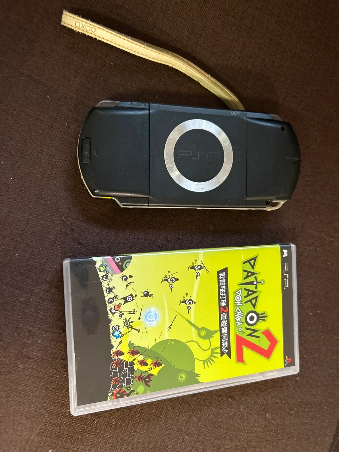 Sony PSP with Patapon 2 Game image indicator(2)