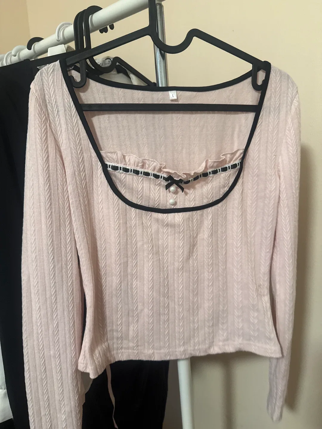 Pink babydoll coquette top with bow accent