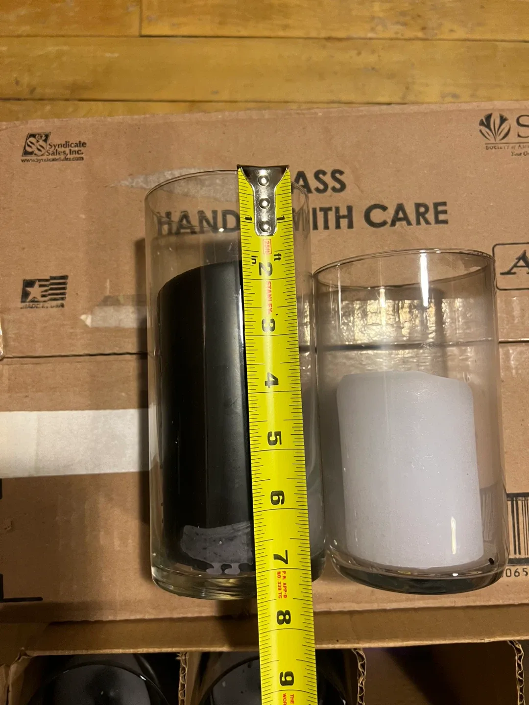 Used Black & White Pillar Candles in Glass Holders image indicator(9)