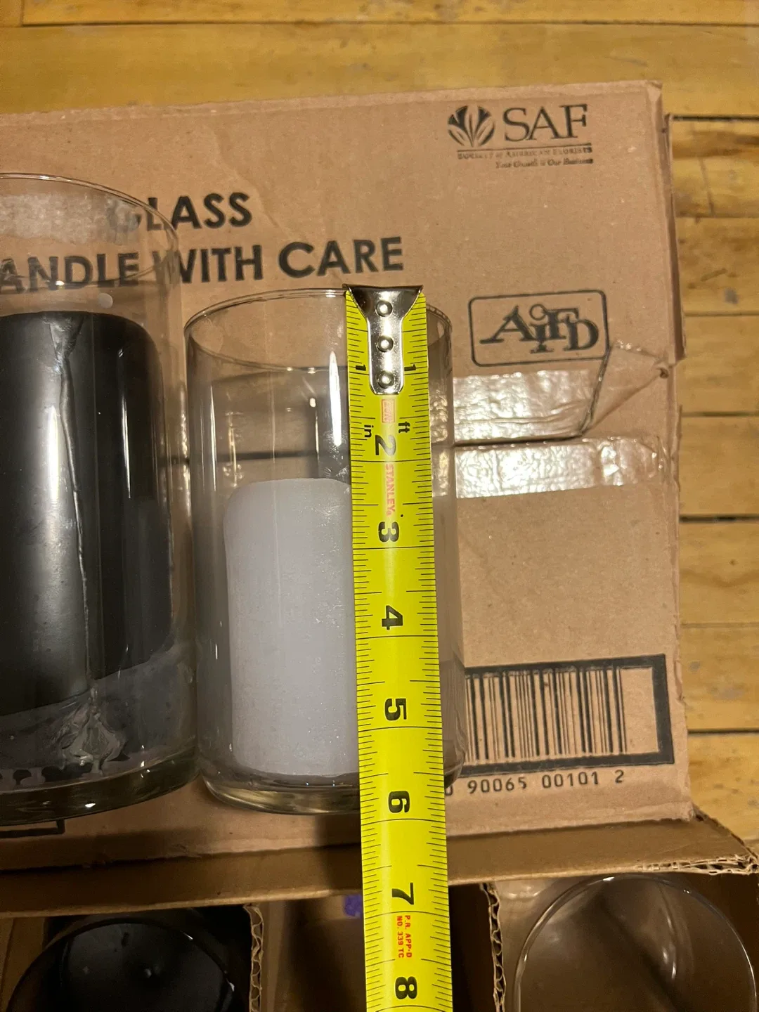 Used Black & White Pillar Candles in Glass Holders image indicator(8)