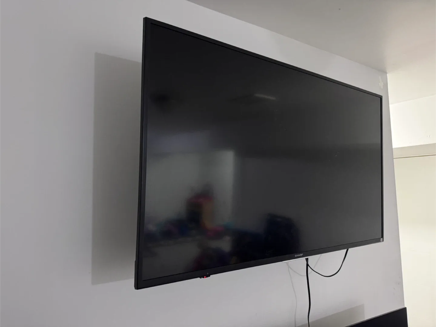 Sharp 55” Smart TV with mount image indicator(2)