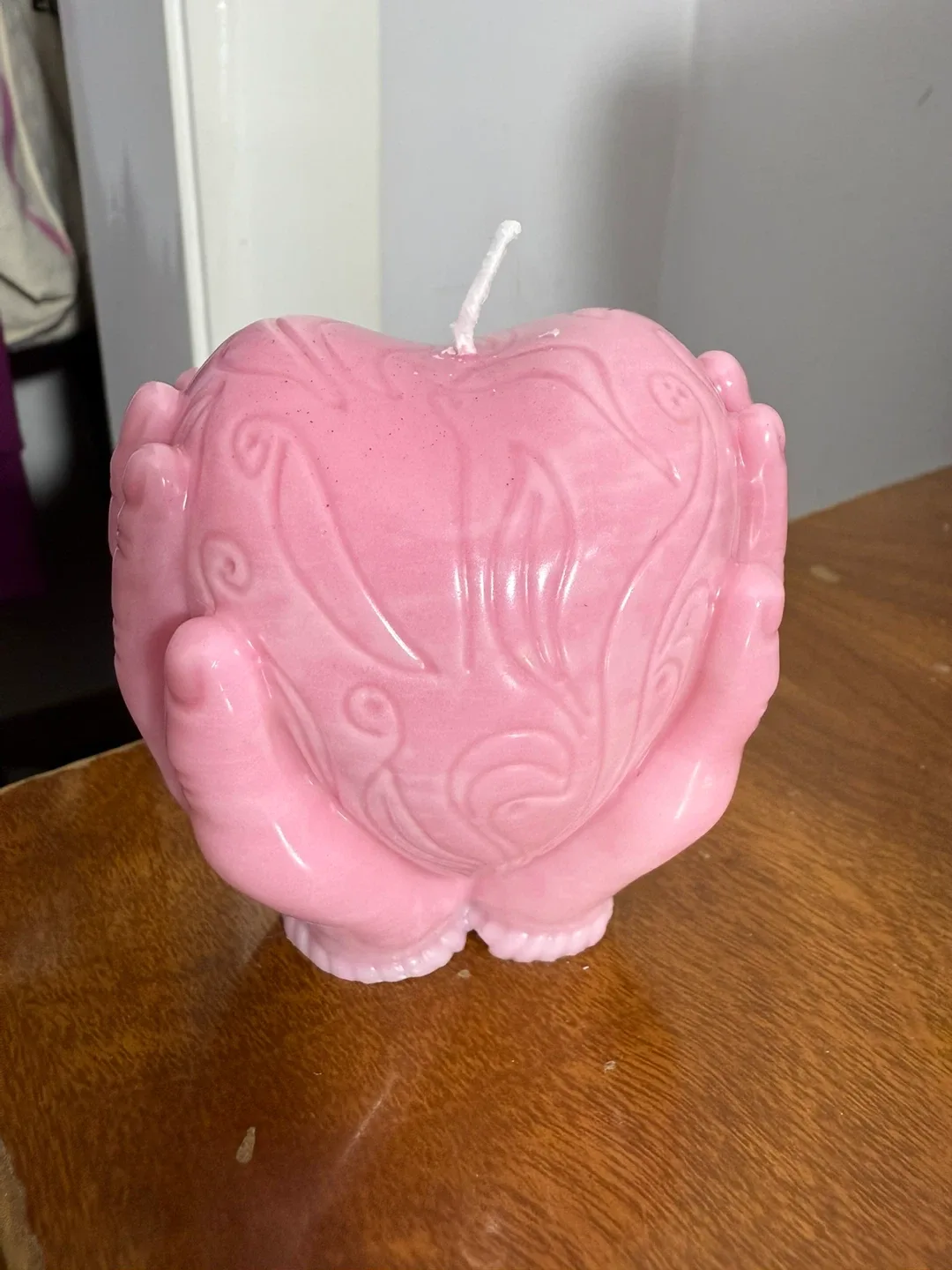 Pink Hands Holding Heart Candle