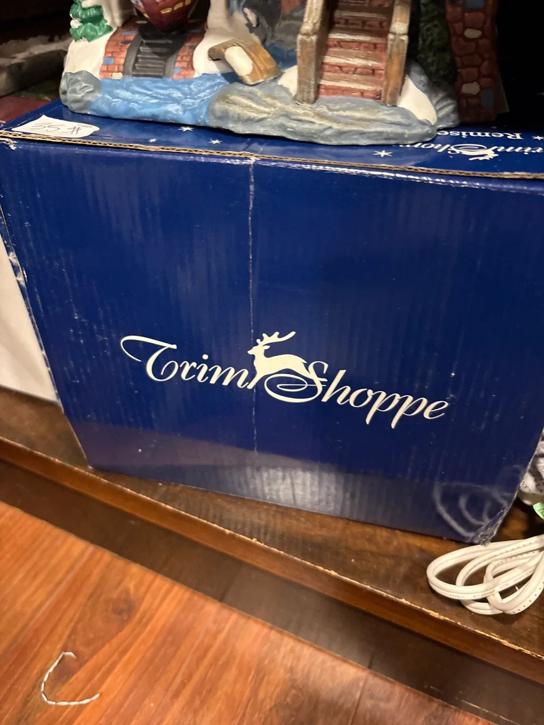 Holiday Expressions 3-D Porcelain Lighted House Toy Shop image indicator(5)