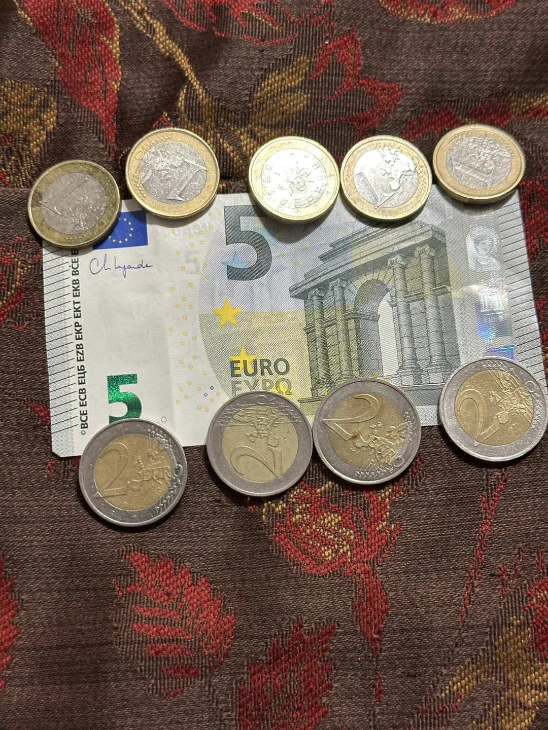 18Euro coins and 5 Euro note thumbnail