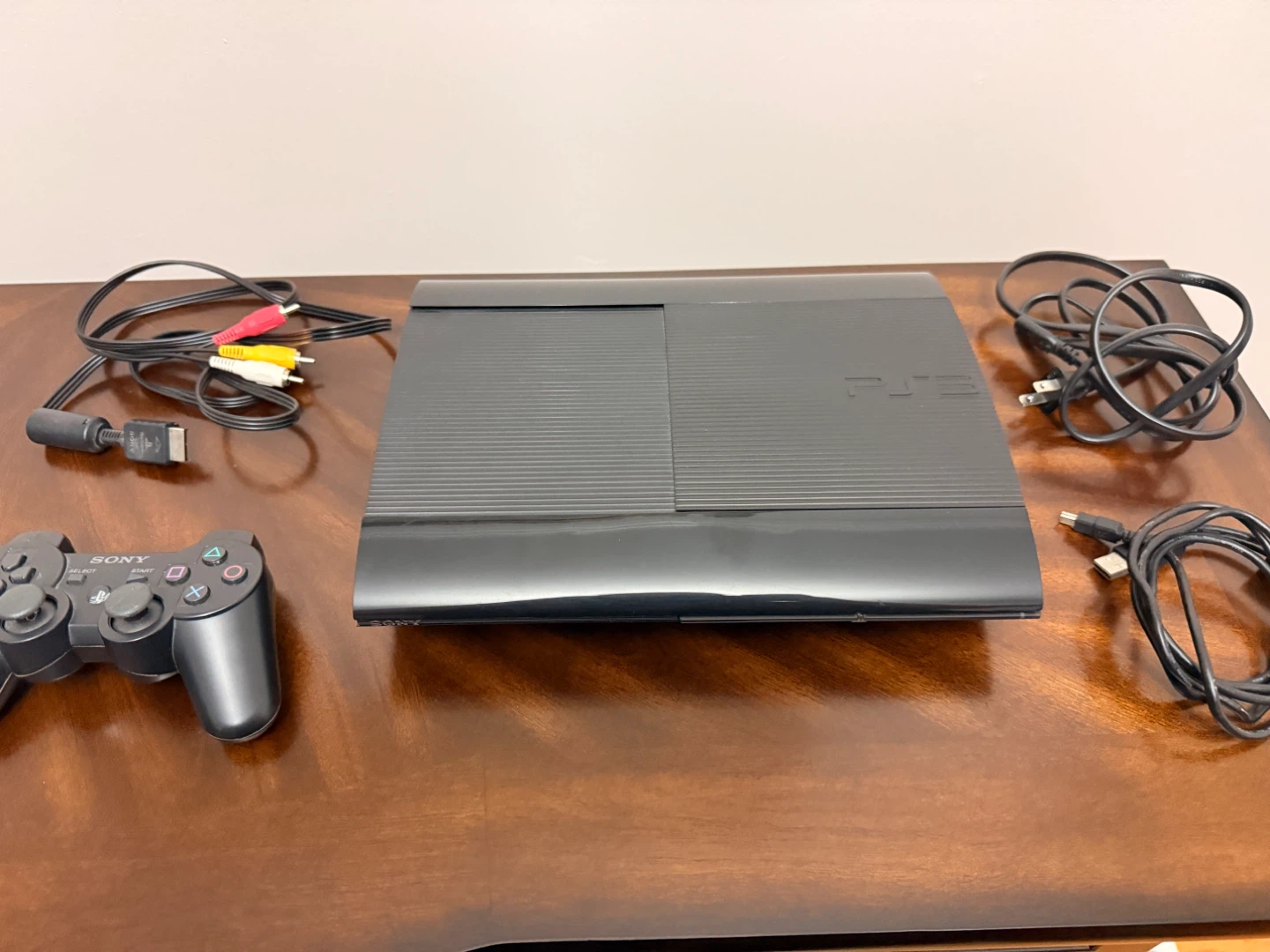 PlayStation 3 Super Slim (PS3) + Controller