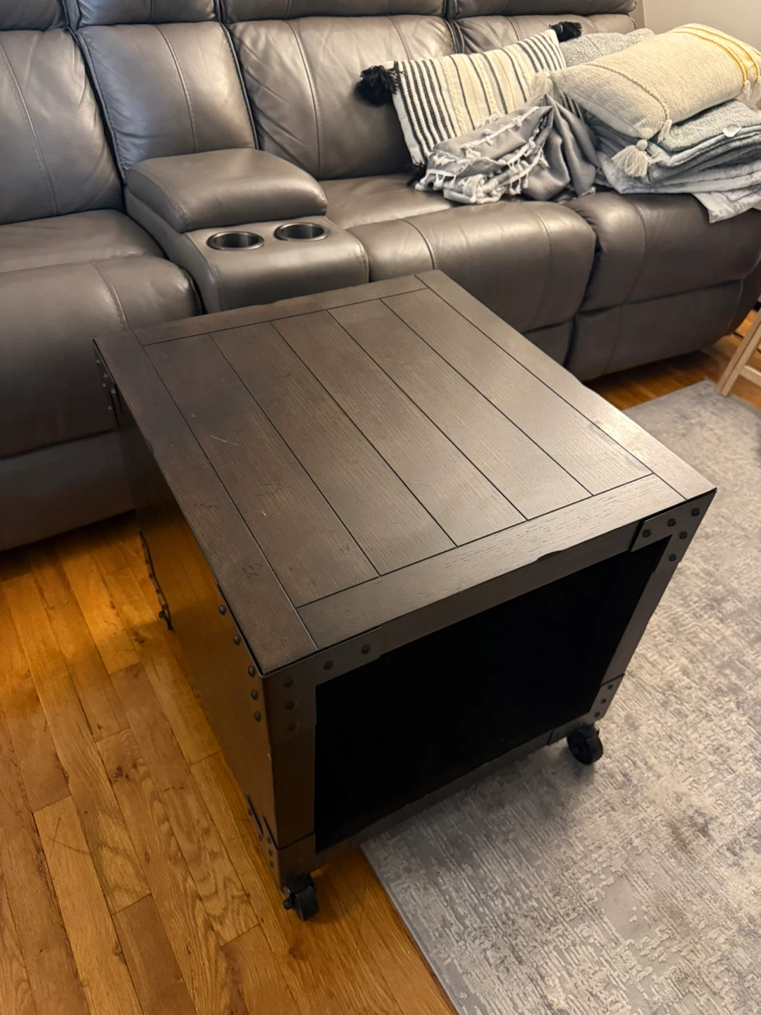 Industrial-style side table with caster wheels
