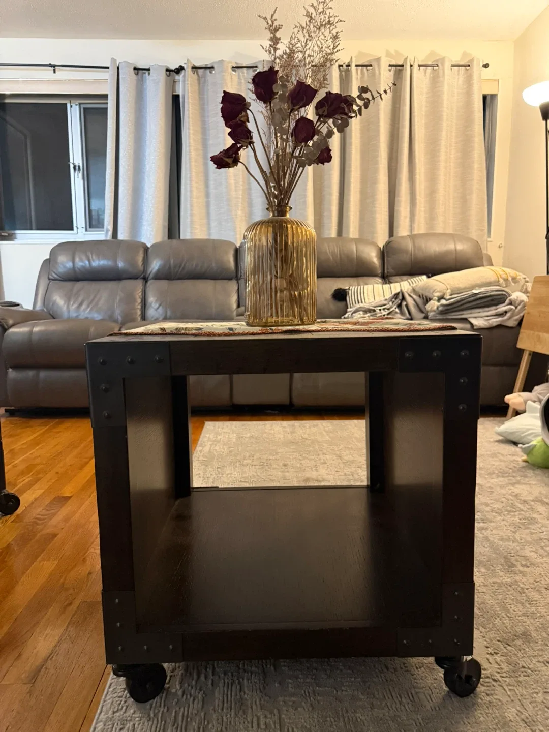 Industrial-style side table with caster wheels image indicator(2)