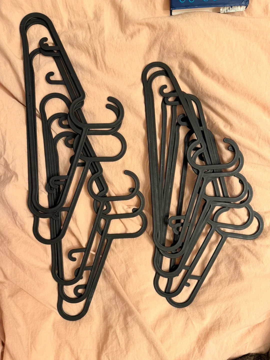 A set of 12 Black Clothes Hangers image indicator(2)