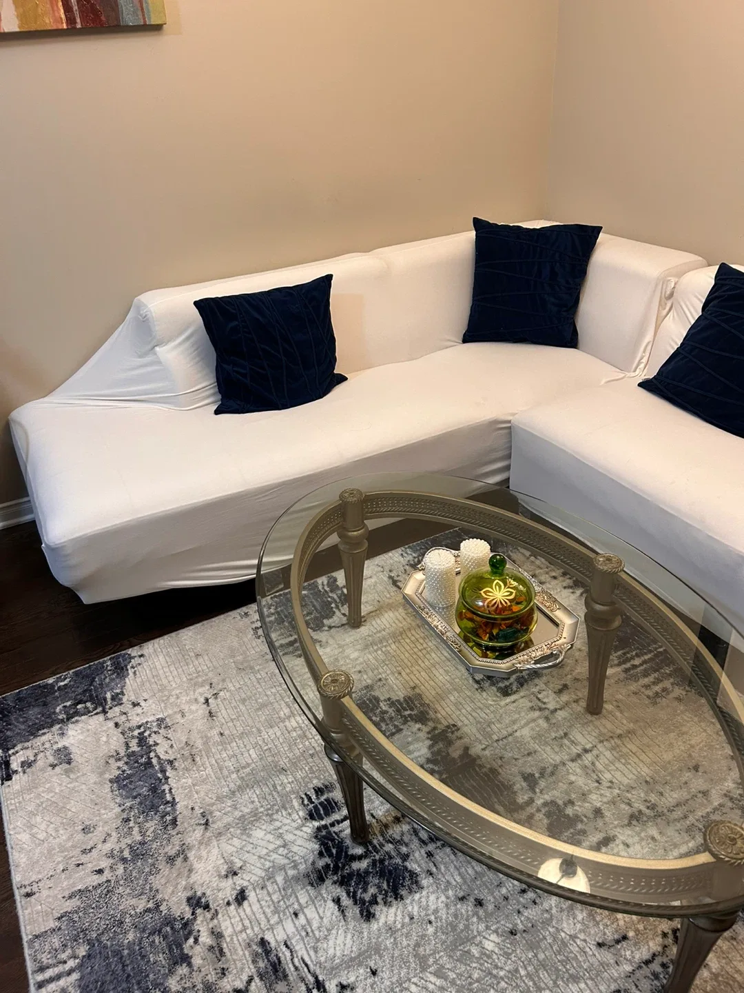 White Sectional Sofa with Navy Pillows image indicator(2)