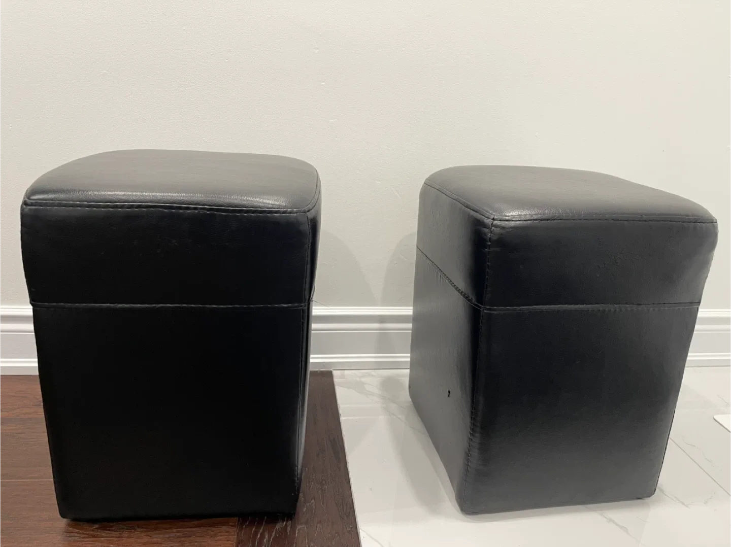 Pair of Black Leather Ottomans thumbnail