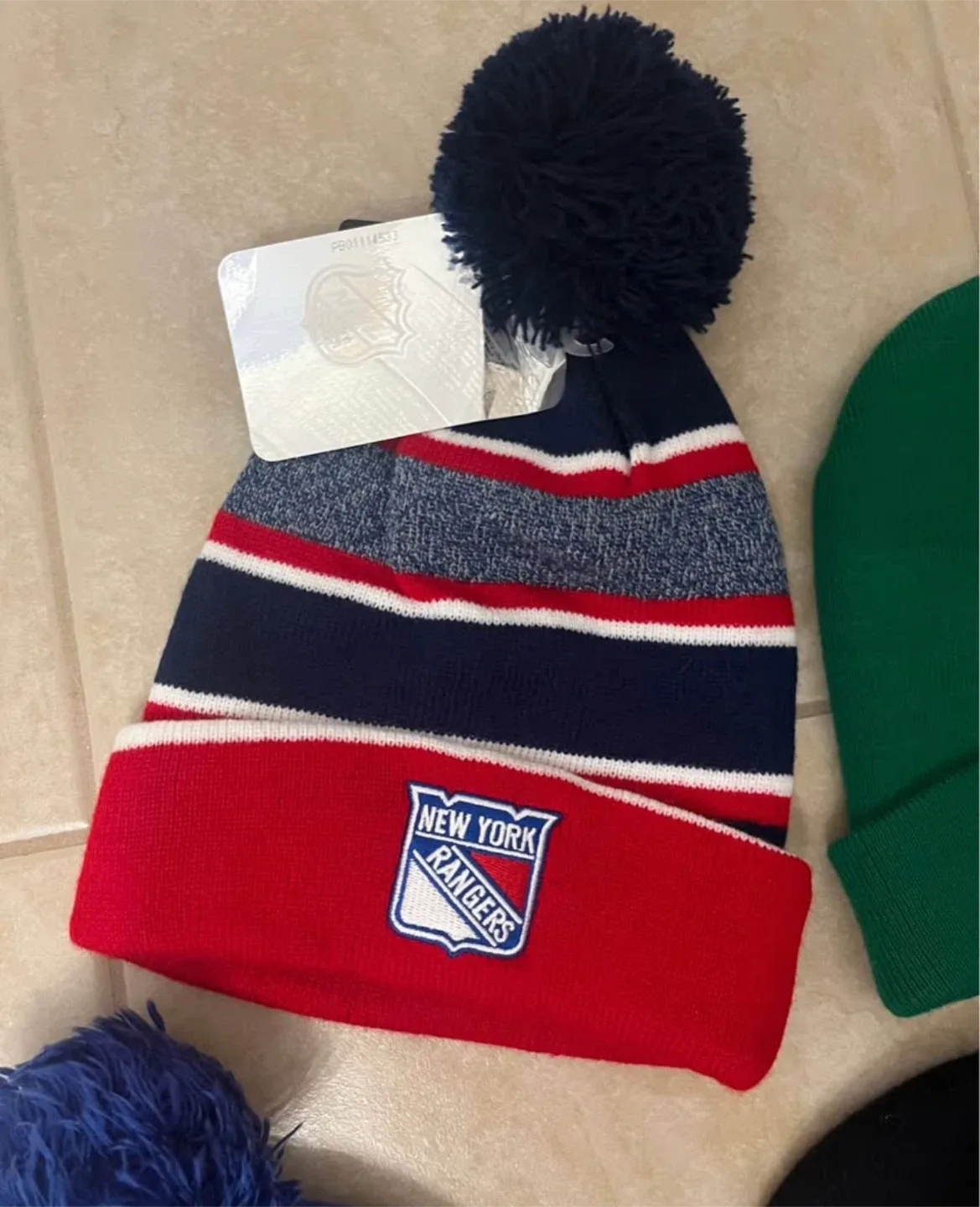 Assorted Toques: Warriors, Rangers, Celtics & more image indicator(2)