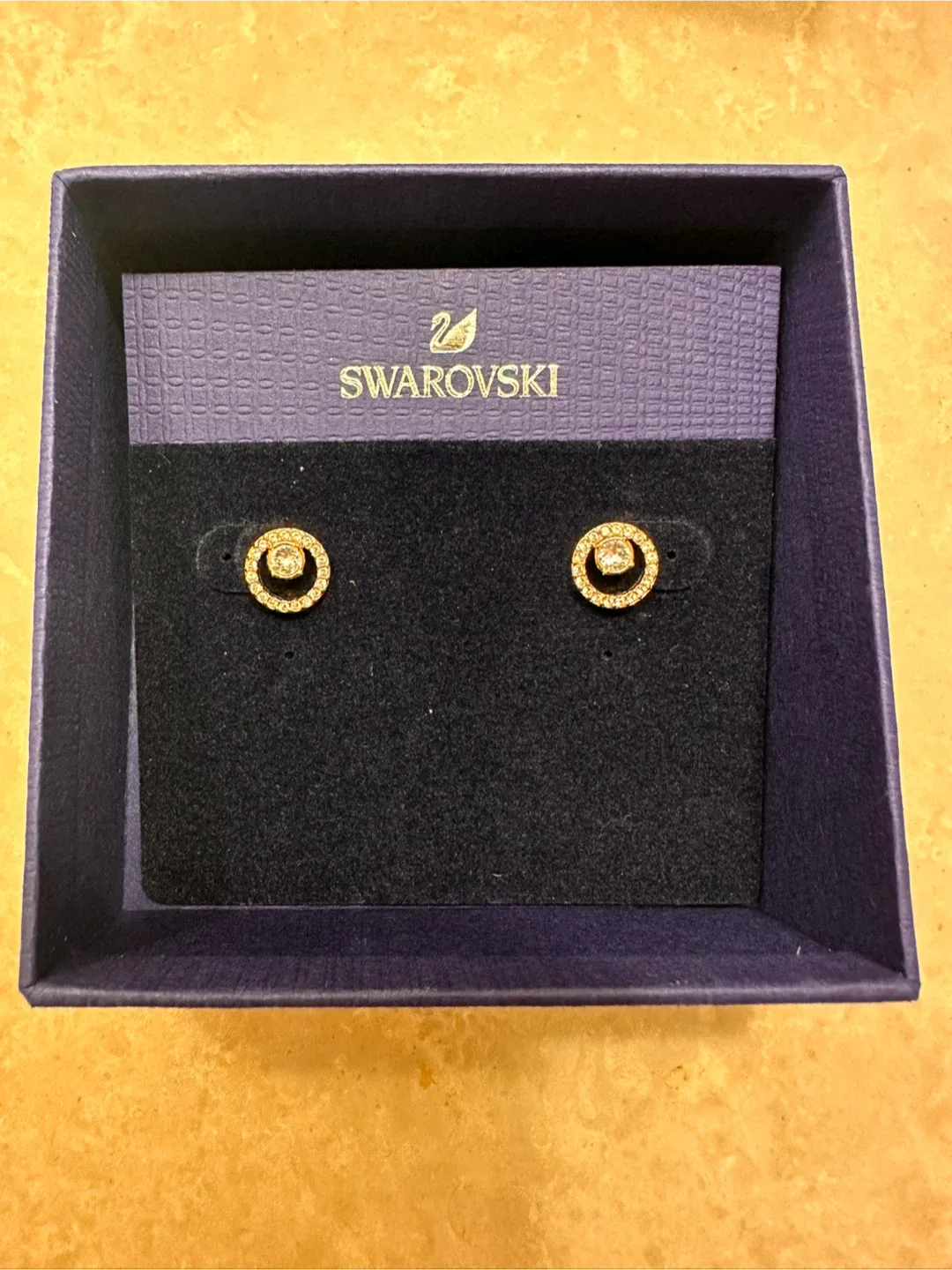 Swarovski Stud Earrings, Rose Gold, retails for 129plus taxes