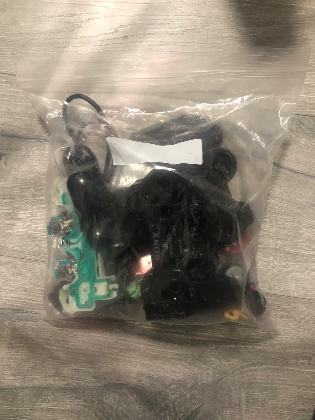 Bag of misc playstation 2 controller parts 🥕