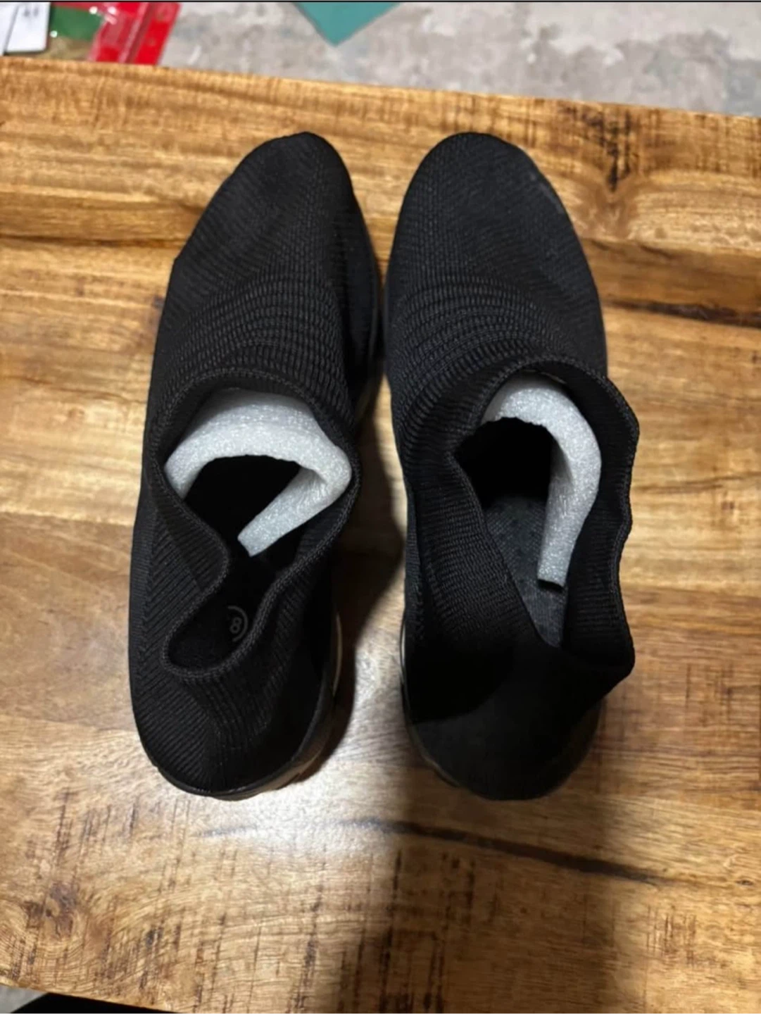 New, Black Slip-On Sneakers. Size: 7