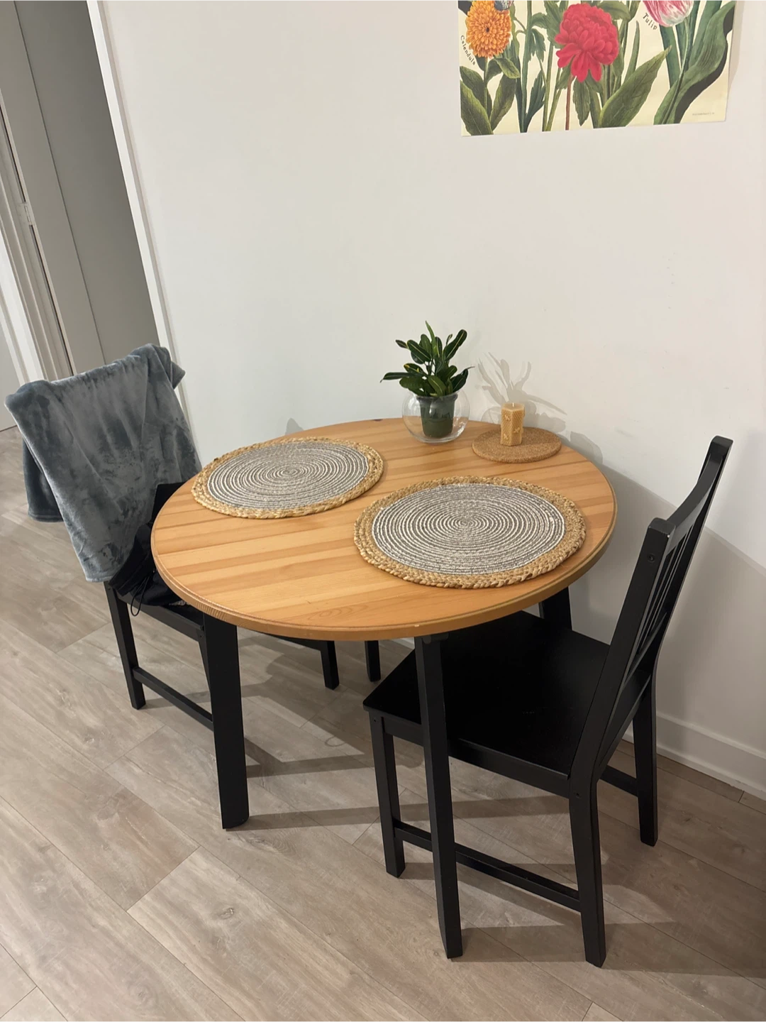 Round Wooden Dining Table with 2 Black Chairs
