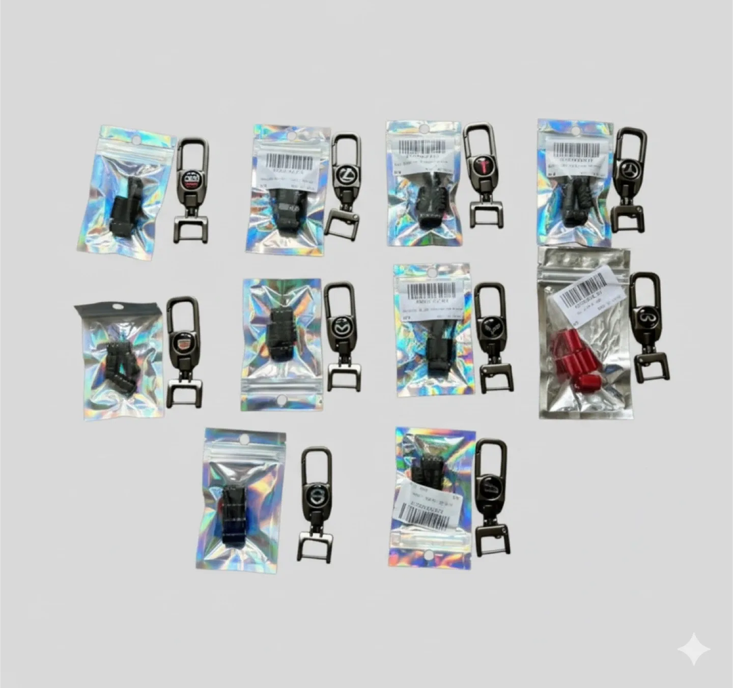 Various Logos Car Keychains and Valve Caps thumbnail