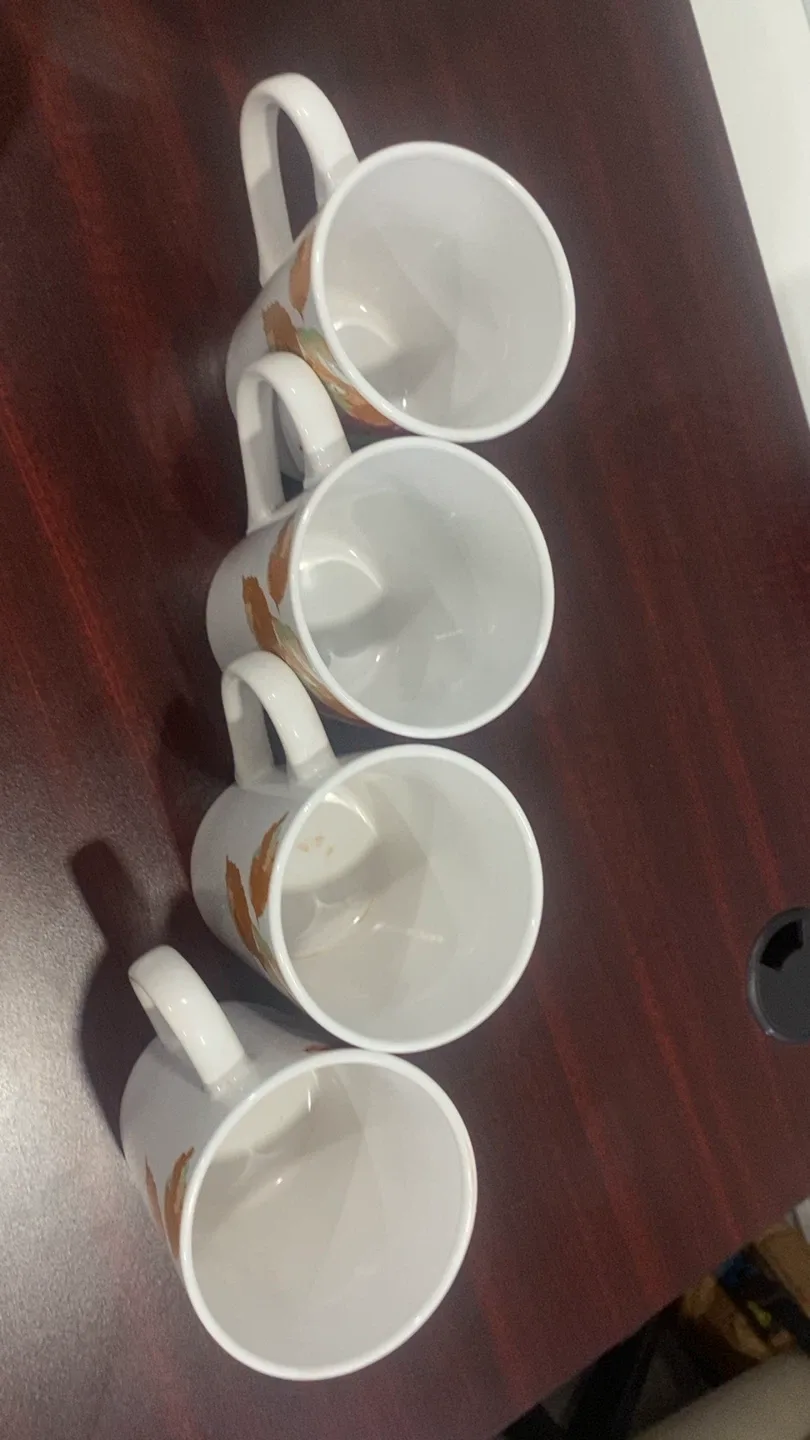 Set of 4 Ceramic Mugs with Leaf Design image indicator(2)