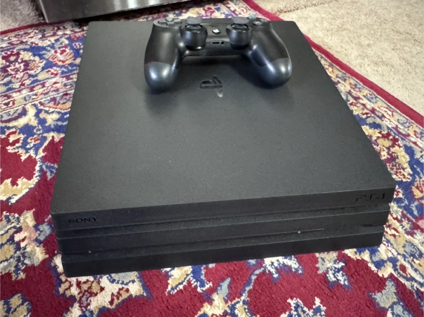 Sony PlayStation 4 Pro Console with Controller and 2 games thumbnail