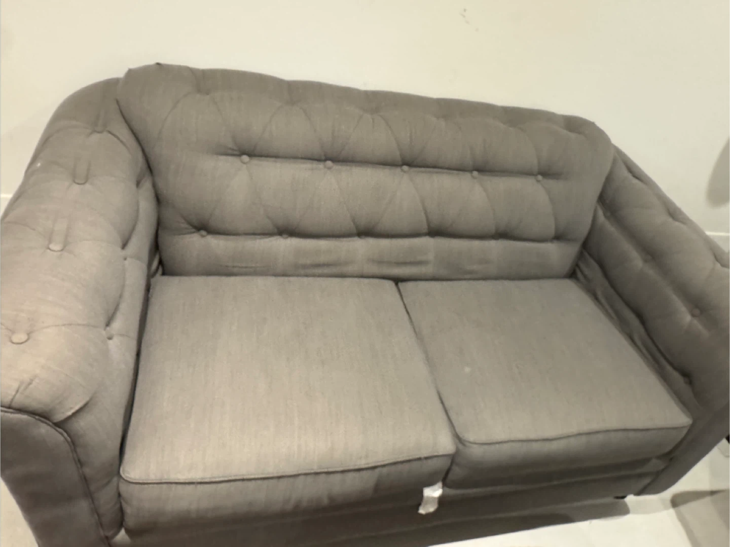 Grey Tufted Loveseat