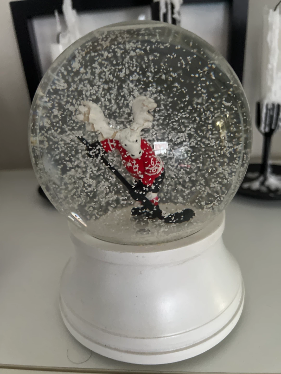 Moose Hockey Player Snow Globe