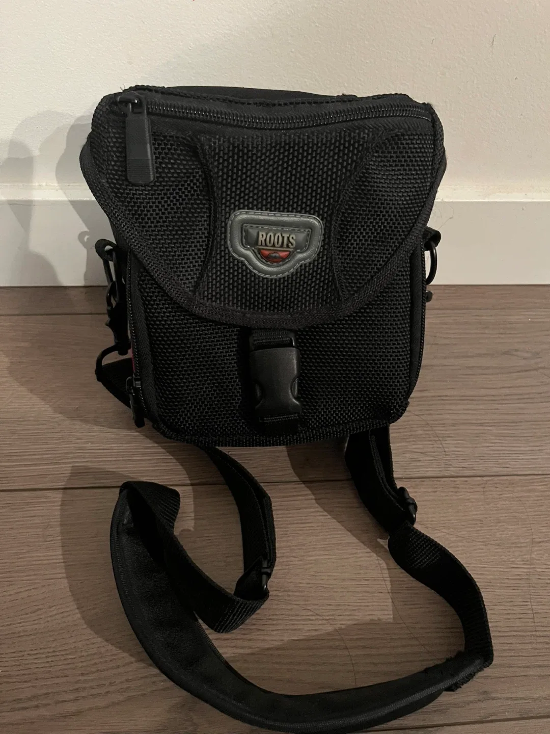 Roots black crossbody camera bag