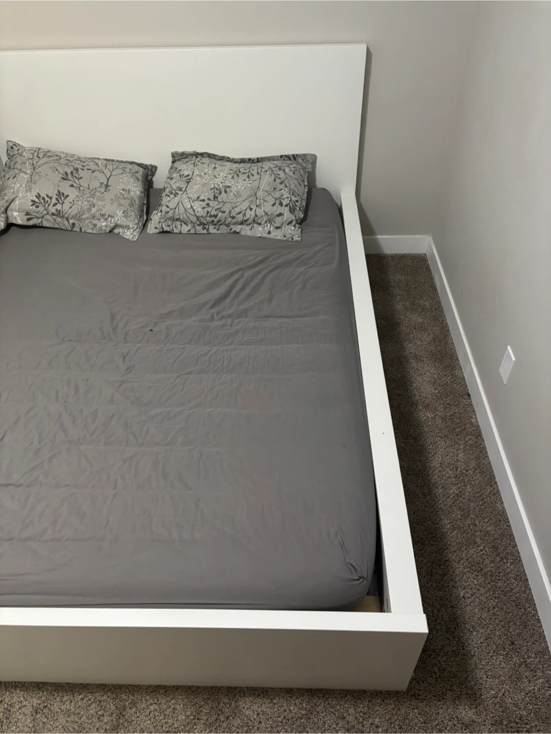 White Bed Frame with Grey Bedding & Floral Pillows - photo 4