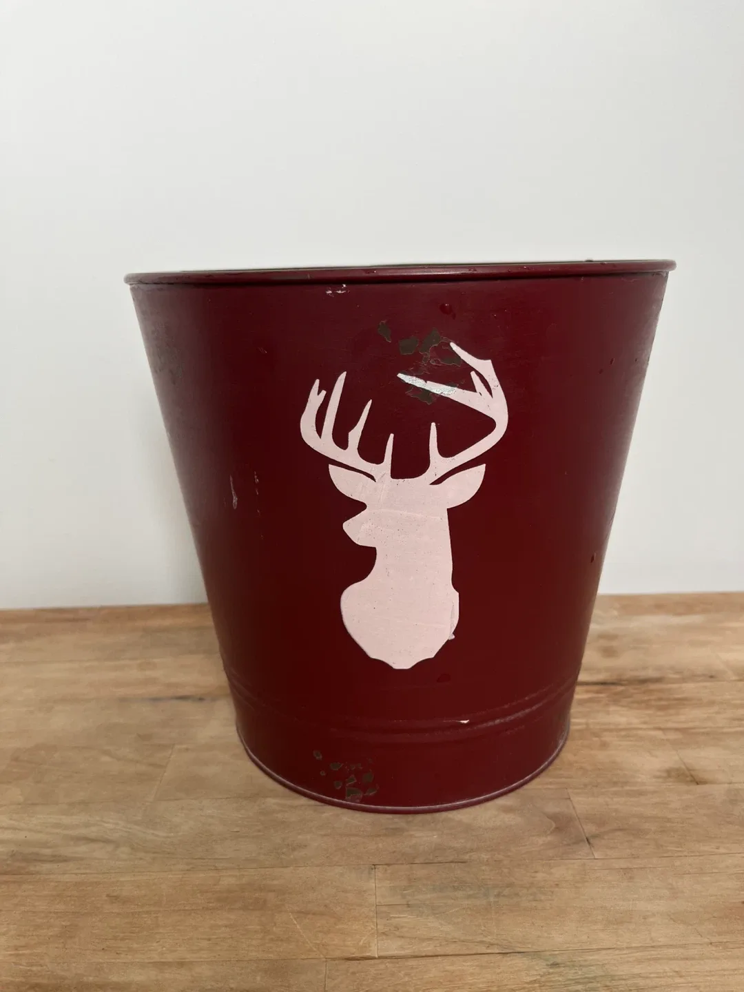 Rustic waste basket/plant pot.