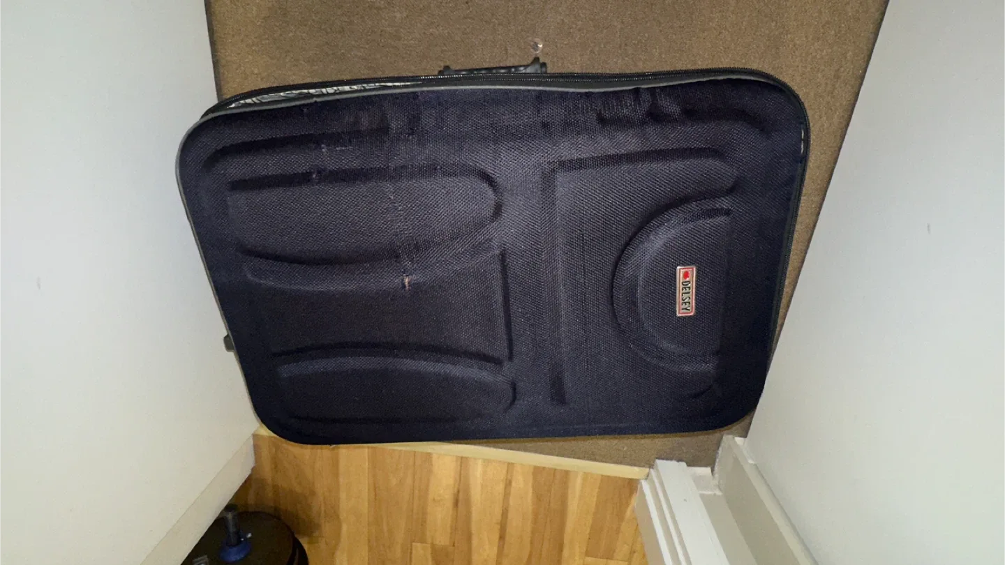 Delsey Black Rolling Suitcase
