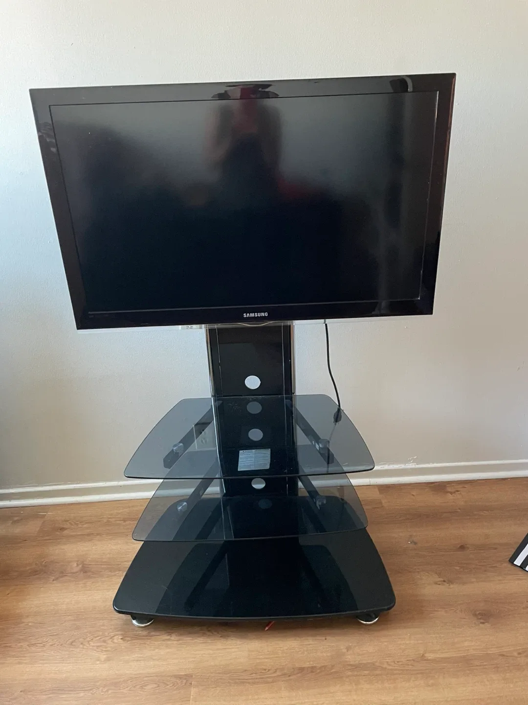 Samsung TV with Black Glass Stand image indicator(5)