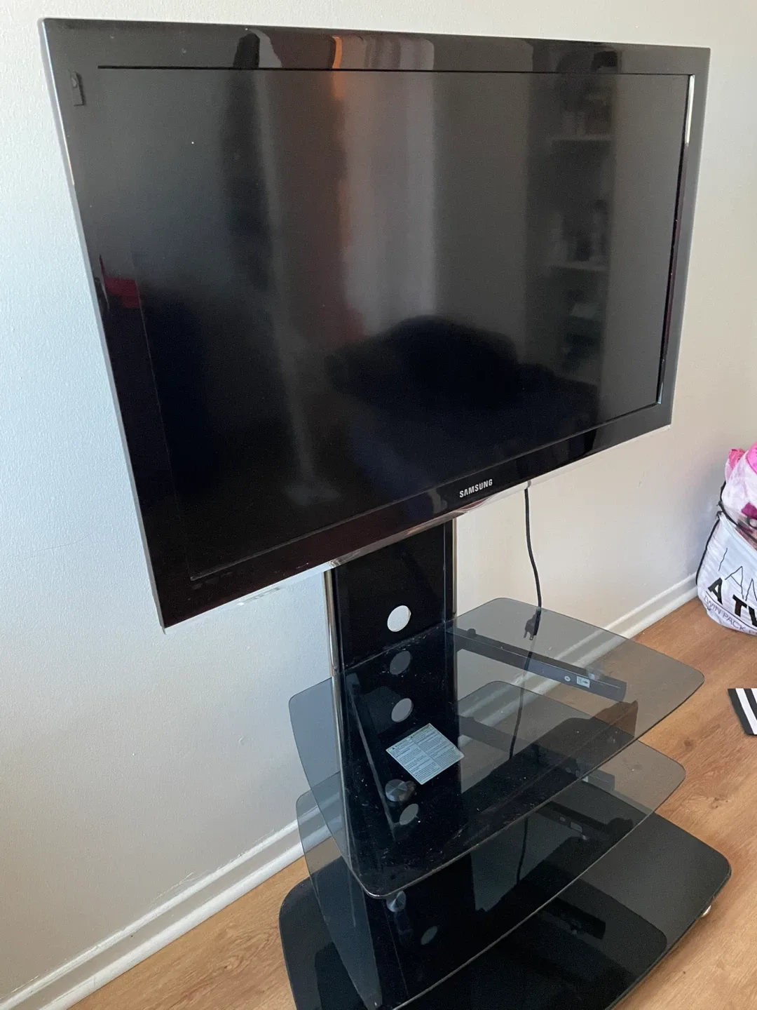 Samsung TV with Black Glass Stand image indicator(3)
