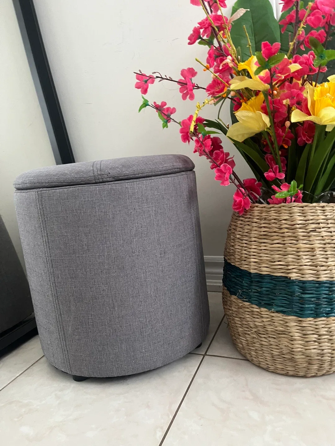 Grey Storage Ottoman. High 15 and diameter 15 x 15“.