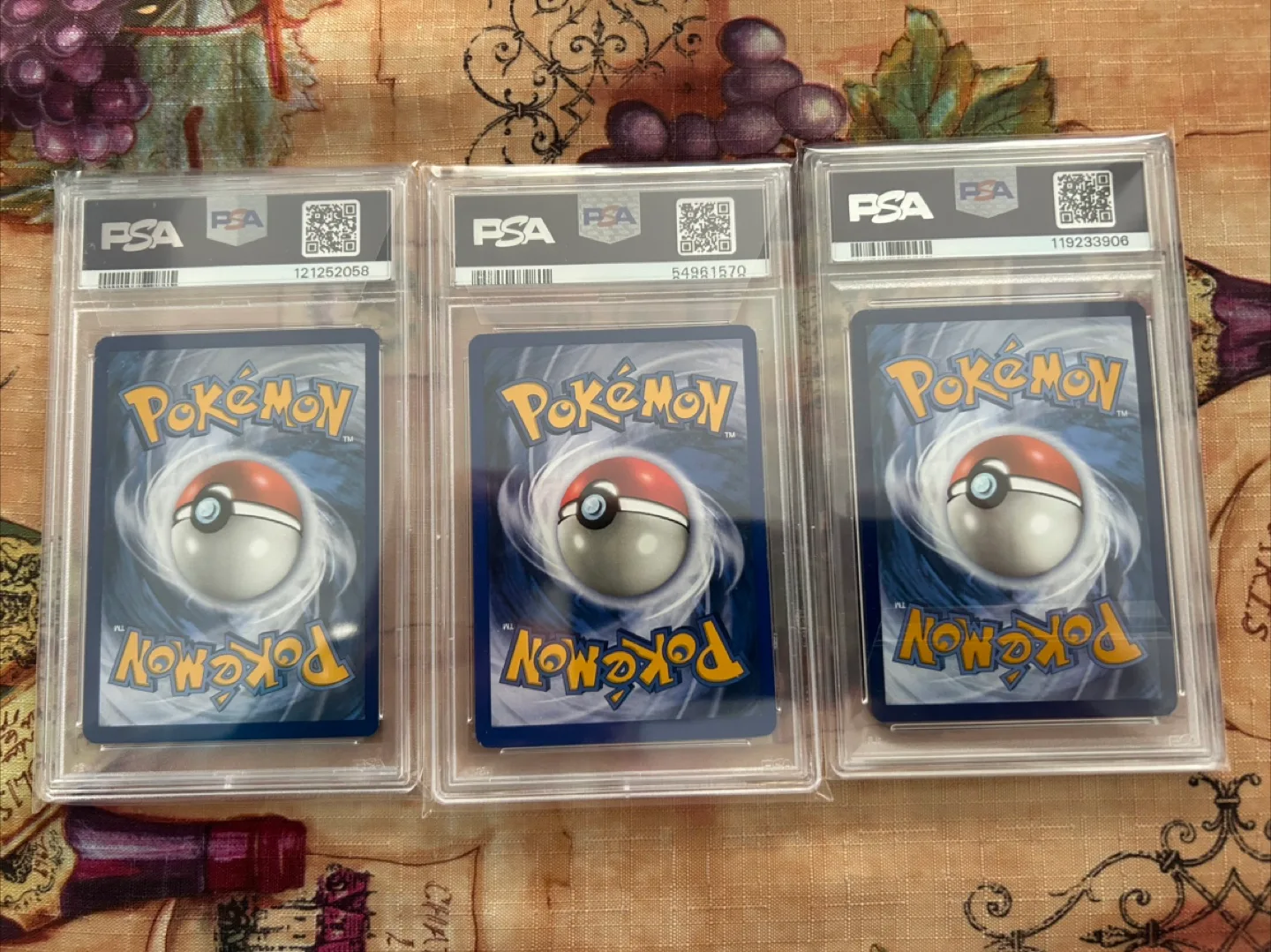 PSA Graded Pokemon Cards - Darkrai, Charmander, Clefairy image indicator(2)