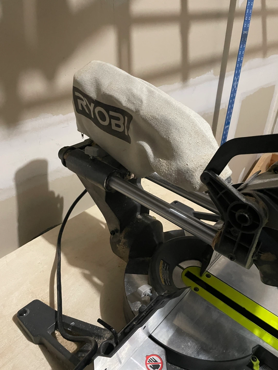 Ryobi compound mitre on stand