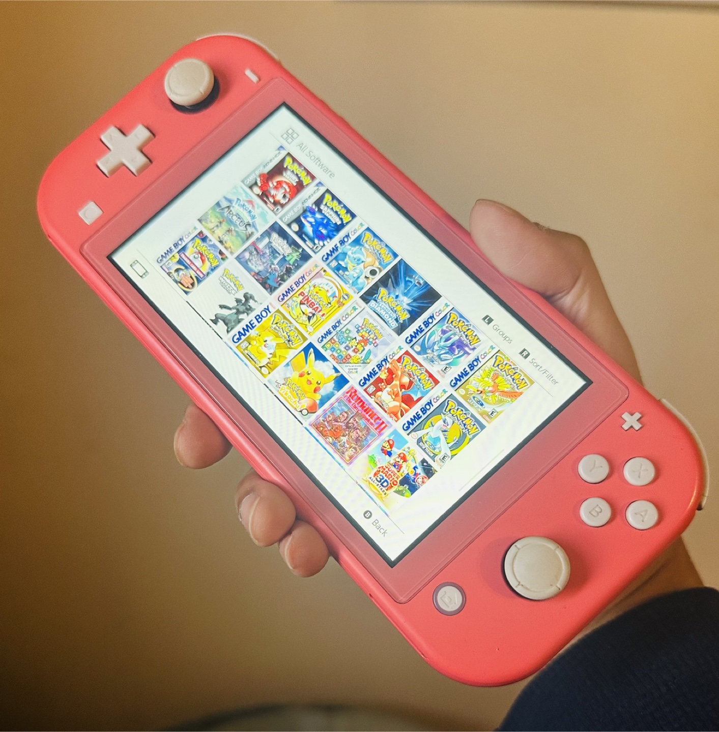 Nintendo Switch Lite Coral w/ 56 Games Pokemon Legends ZA