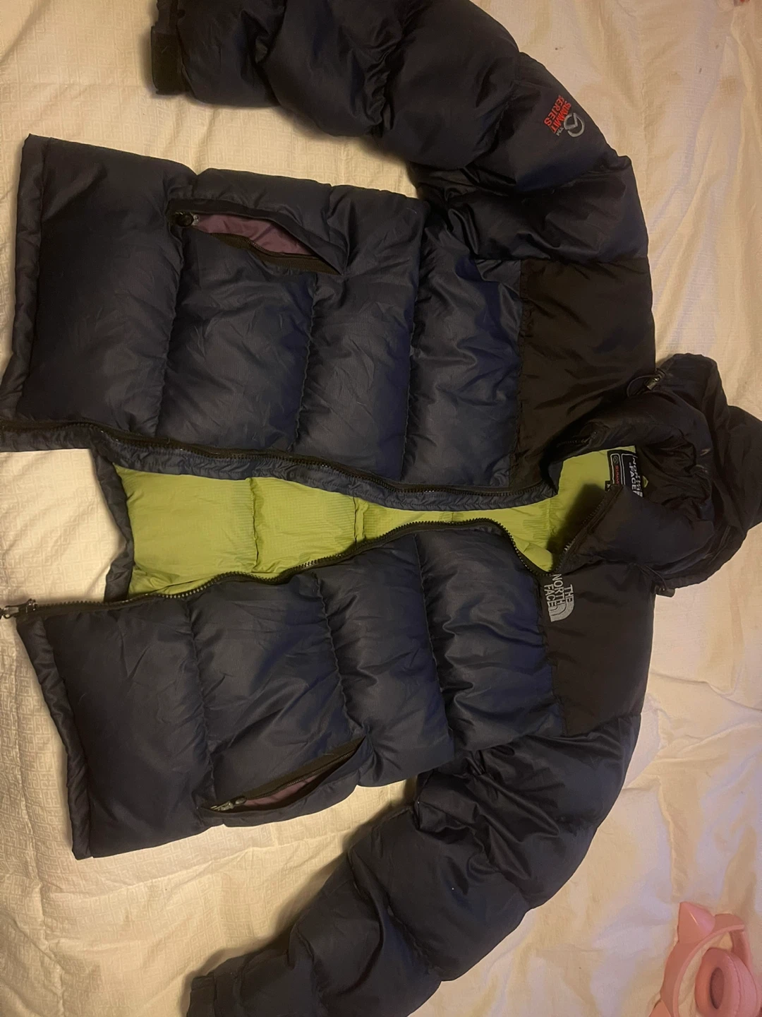 Men’s North Face Summit Series down puffer jacket.