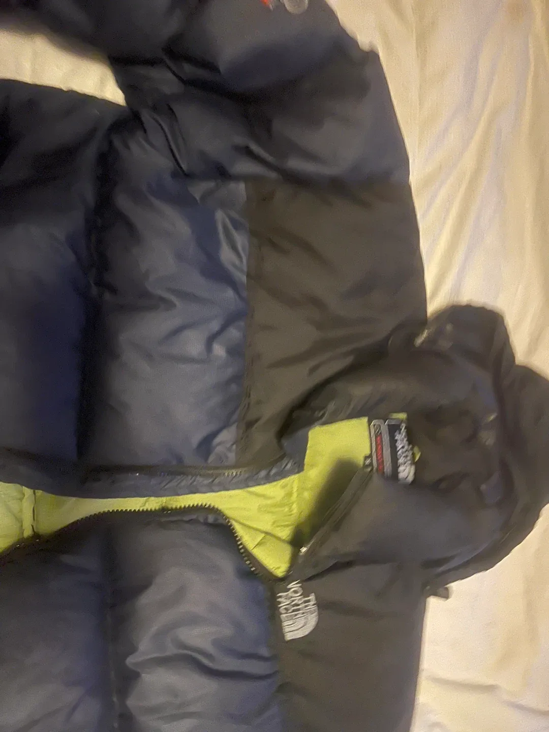Men’s North Face Summit Series down puffer jacket. image indicator(2)