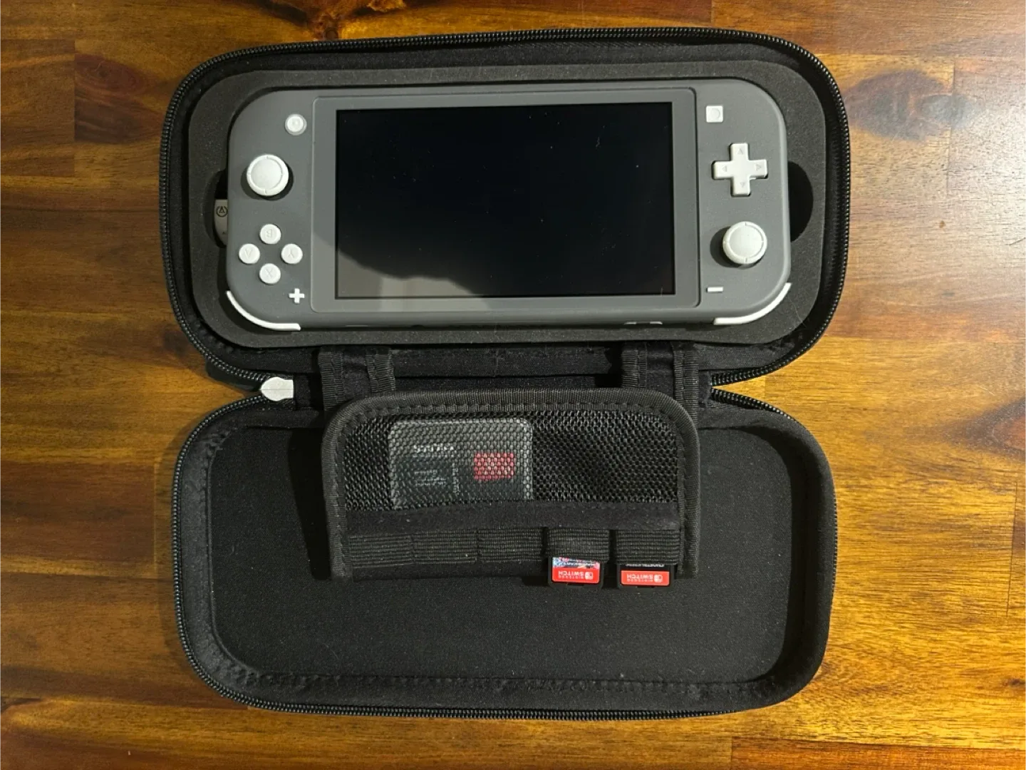 Nintendo Switch Lite (Grey) with Case & Games image indicator(2)