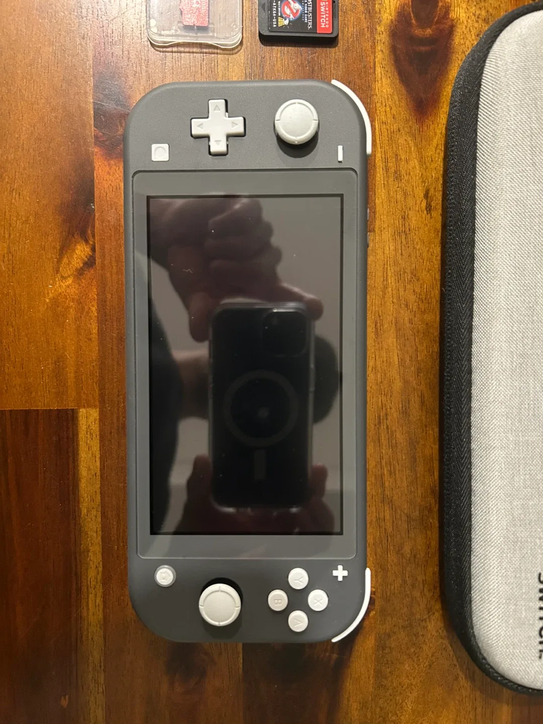 Nintendo Switch Lite (Grey) with Case & Games image indicator(4)