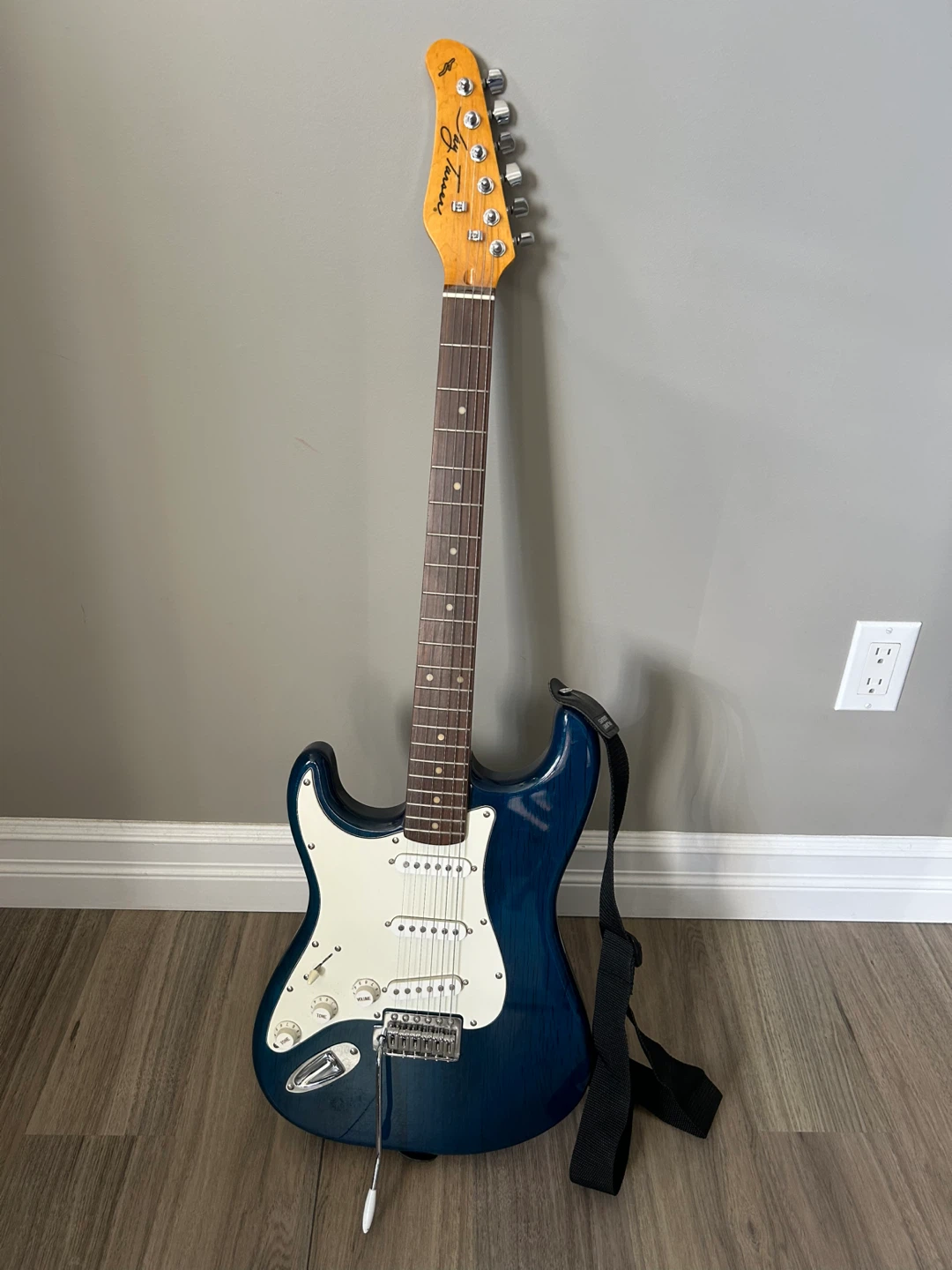 Blue left handed electric guitar