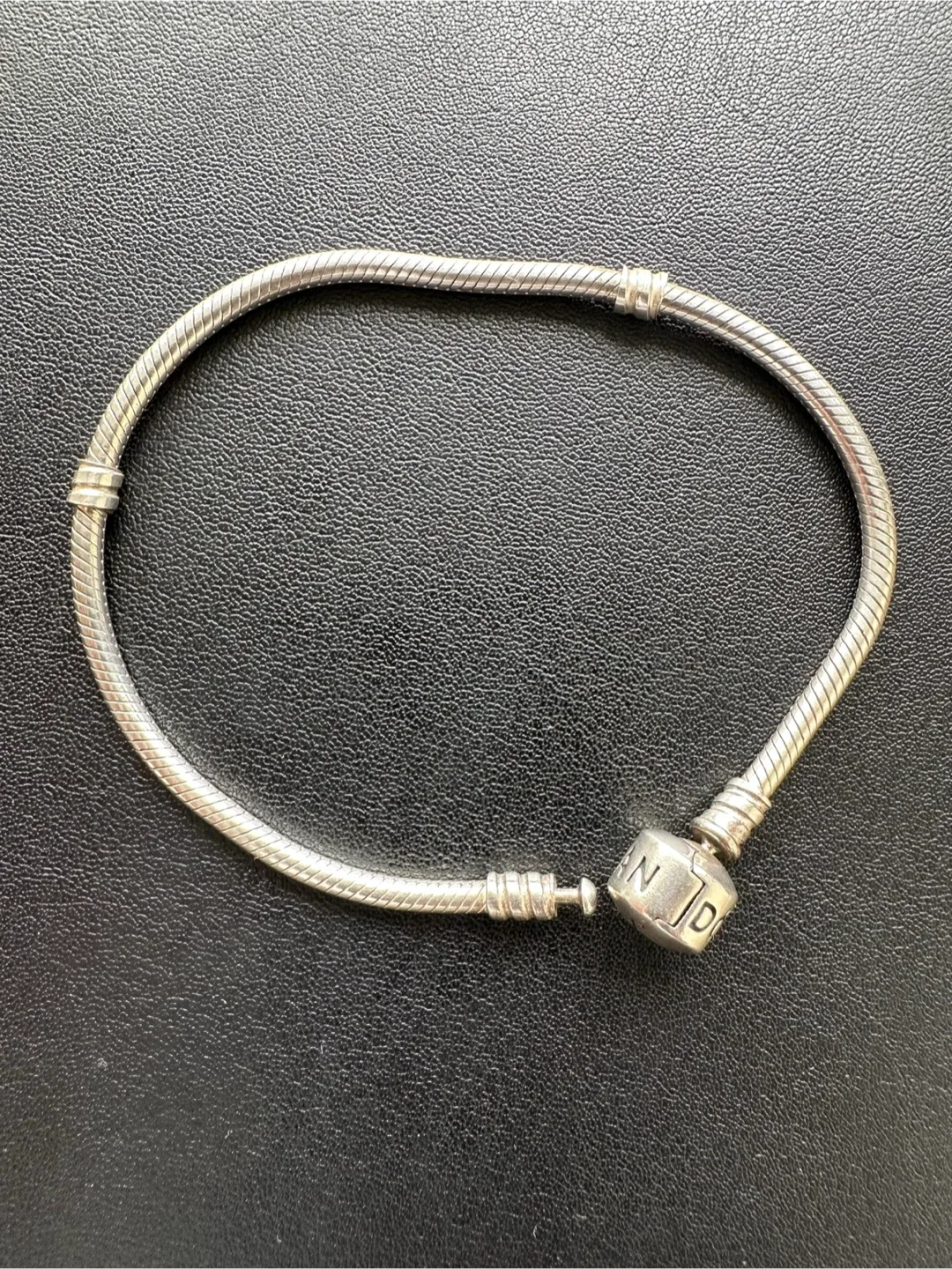Pandora Bracelet with Assorted Charms $50 image indicator(3)