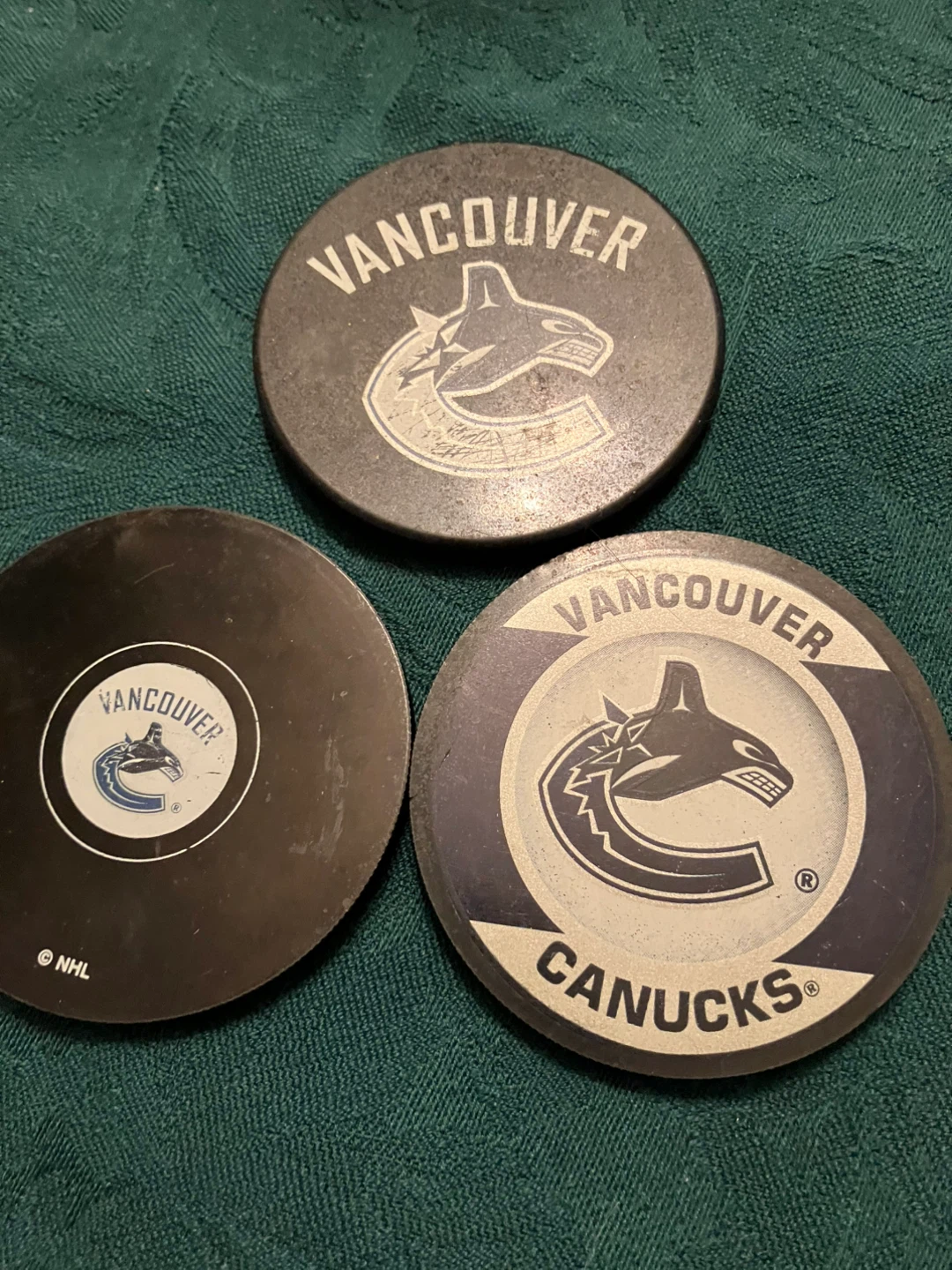 Vancouver Canucks Pucks, Glass, and Towels